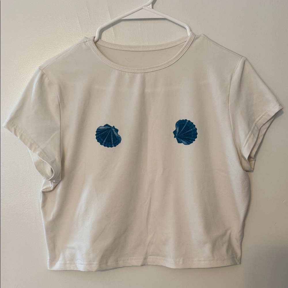 White Crop Top with Blue Shell Design
